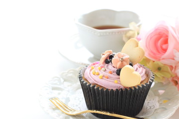 Blueberry cup cake and tea