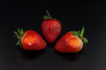  fresh strawberries. black background. crop 2019. one or more. Healthy food. Healthy lifestyle