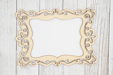 Wood picture frame on weathered whitewash textured wood background