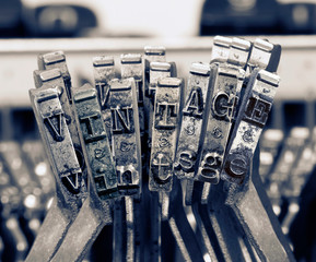 the word VINTAGE with old typewriter 