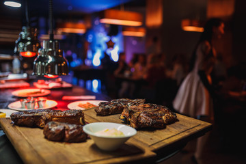 Steaks at the restaurant background