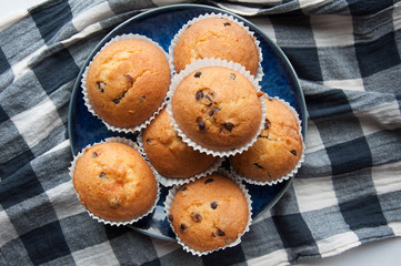 Chocolate Drops Muffins. Delicious sweet dessert. Sweetness to tea. Homemade baking. Treats for children. Popular cupcake.