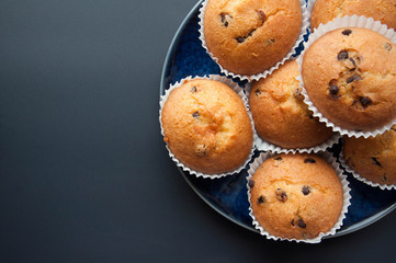 Chocolate Drops Muffins. Delicious sweet dessert. Sweetness to tea. Homemade baking. Treats for children. Popular cupcake.