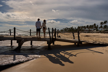 Happy couple enjoying a beach holiday