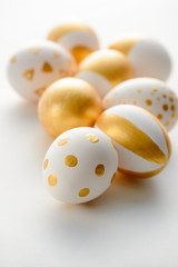 Easter eggs painted with gold
