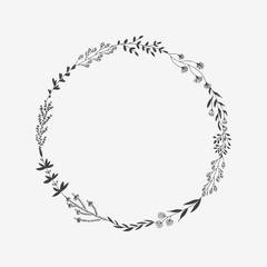 Hand drawn vector round frame with floral elements, herbs, leaves, flowers, twigs, branches