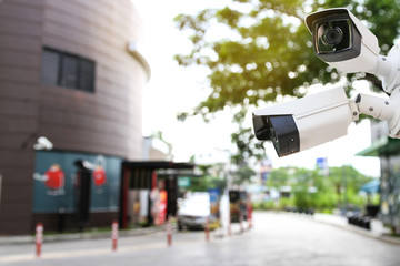 Outdoor CCTV monitoring, security cameras at drive thru fast food restaurant.