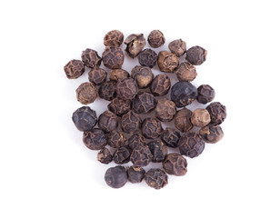 black pepper grains isolated on white background