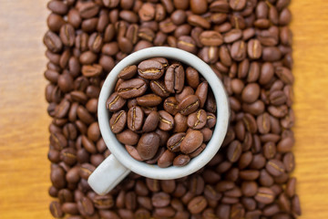 cup with coffee beans - square top