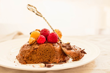 Chocolate mousse with raspberries. Copy space for text. Horizontal.