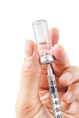 Syringe, medical injection vaccination in hand.