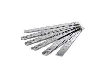 Steel folding ruler isolated on white background.