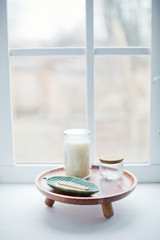 candle on a windowsill