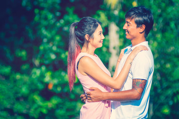 Asians, Man and woman, hugs, garden