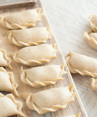 Raw meat pelmeni, ravioli, dumplings