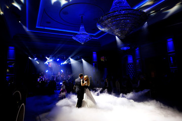 Beautiful wedding couple dancing on their wedding