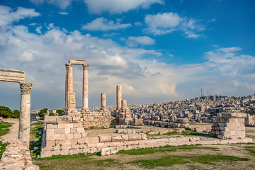 .02-18-2019 Amman, Jordan, people walking and photographing near the ruins of the Hercules Temple...