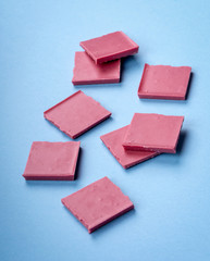 Ruby chocolate on blue background