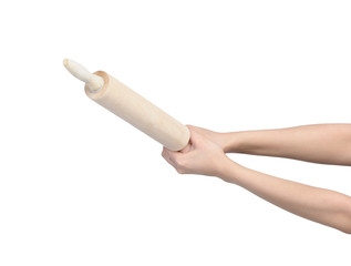 Female hand holding rolling pin