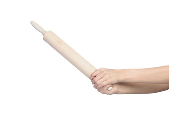 Female hand holding rolling pin