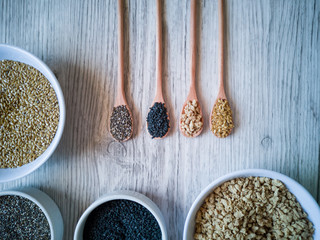 Wooden spoons with Chia, black sesame, soy, golden flaxseed