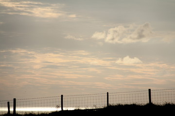 Silhouette of a fence