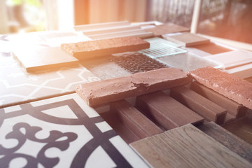  samples of material, wood , on concrete table.Interior design select material for idea. Decoration idea concept vintage material.