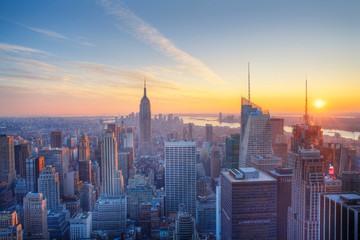 Empire State building and Manahttan skyline at sunset new york city new york usa
