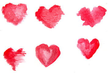 Watercolor red hearts  on a white background. hand pained on the paper