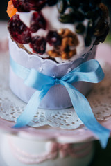 Easter cake with raisins, nuts covered with a layer of glaze