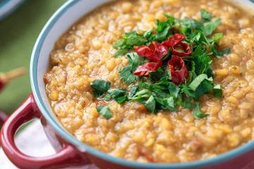 Indian soup of red lentil masoor dal. Vegetarian lentil soup.