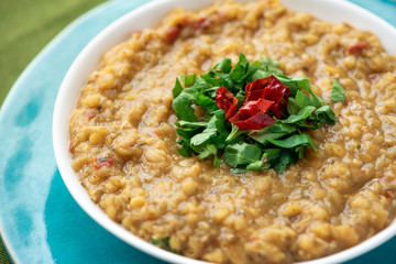 Indian soup of red lentil masoor dal. Vegetarian lentil soup.