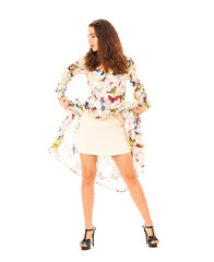 Portrait in full growth the young beautiful brunette woman in long dress