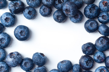 Fresh ripe blueberries isolated on white background