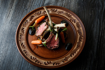 top view big pieces of juicy rare grilled ribs with meat steak