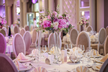 Beautiful flower decoration on a wedding table, selective focus