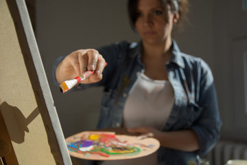 Beautiful woman painting