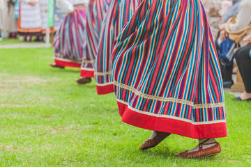 Details of the national costume of Estonia. Dance holiday