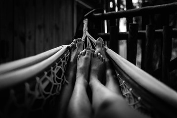 Feet together in hammock