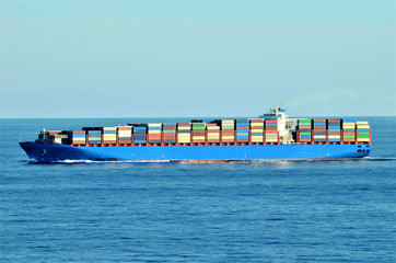 Container ship sailing through Pacific Ocean
