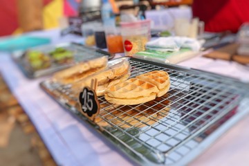 tasty sweet waffles in street food