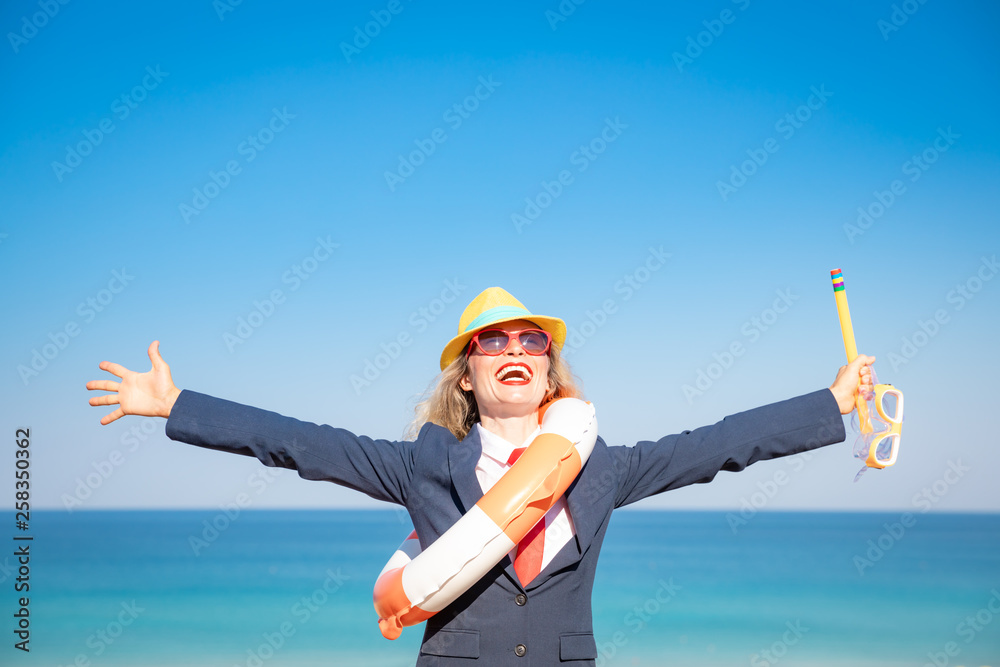 Canvas Prints Successful young businesswoman on a beach