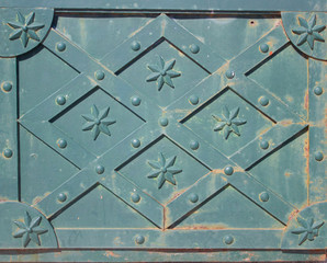 Obraz premium Old iron door green with rust elements.