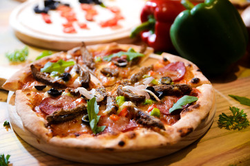 Slice of hot pizza cheese lunch or dinner crust seafood meat topping sauce with bell pepper vegetables delicious tasty fast food italian traditional on wooden board table classic with delivery hand 