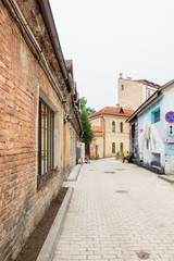 Fototapeta na wymiar VILNIUS, LITHUANIA - September 2, 2017: Uzupio in Vilnius' old town, a UNESCO World Heritage Site