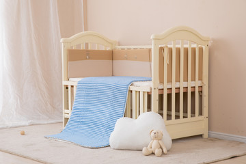 White children's beds, blue mattresses