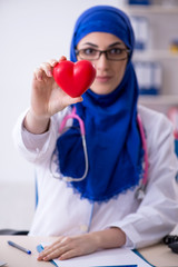 Arab female doctor working in the clinic