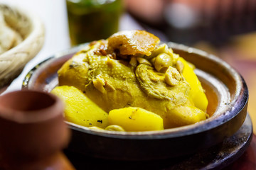 Chicken lemon tagine, with green olives, preserved lemons and potatoes
