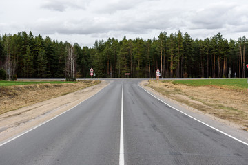 T-junction. Asphalt crossroad. 