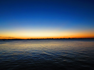 Sunset at dusk on the lake peaceful nightfall